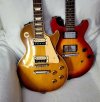 Sunburst Gibson Les Pauls in chair Cherie Cassie 2022.jpg