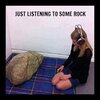 funny-pictures-listening-some-rock.jpg