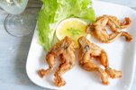 71052670-fried-frog-legs-on-plate-food-concept.jpg