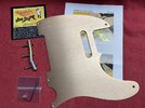 Pickguard and saddles.JPG Pickguard and saddles.JPG