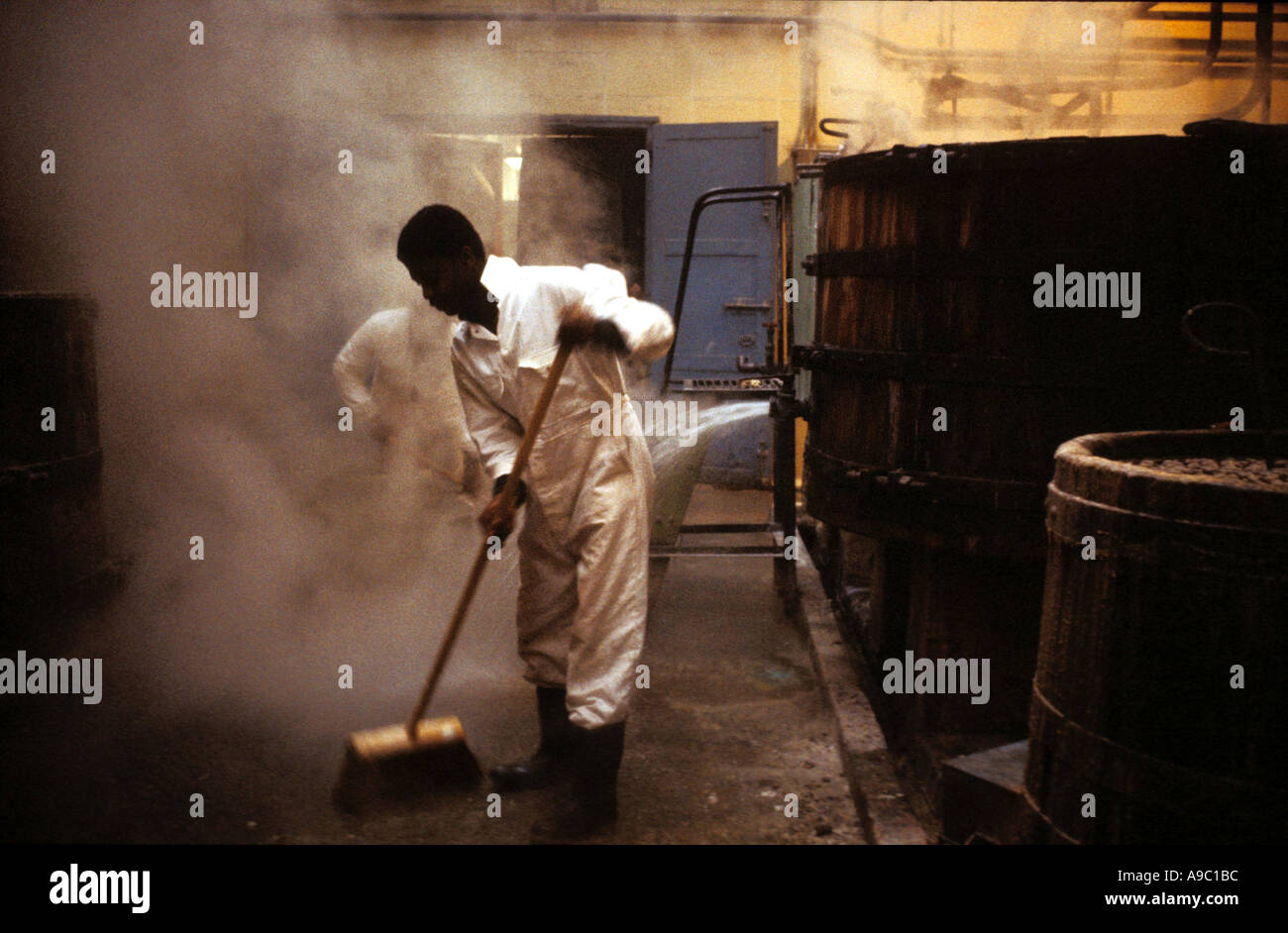 man-sweeping-factory-floor-A9C1BC.jpg