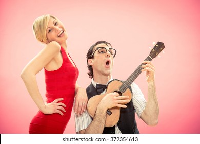 nerd-man-boyfriend-play-ukulele-260nw-372354613.jpg